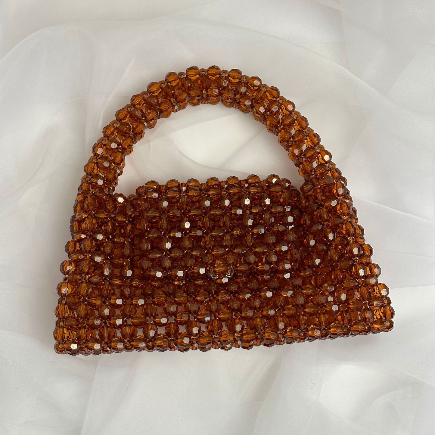 Bolso de mano de moda con cuentas hechas a mano en color marrón