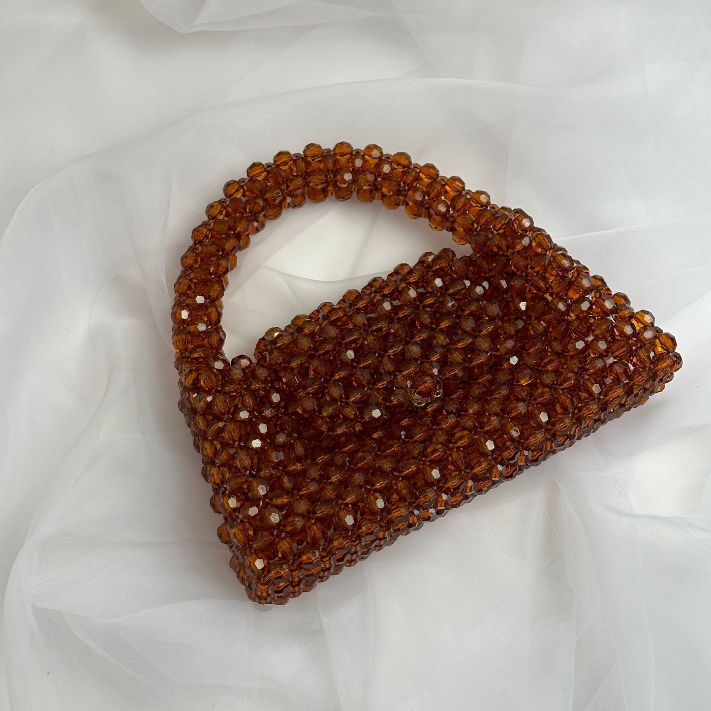 Bolso de mano de moda con cuentas hechas a mano en color marrón