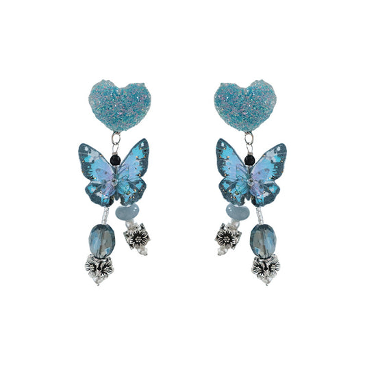 Pendientes de plata de ley con cuentas de mariposa azul
