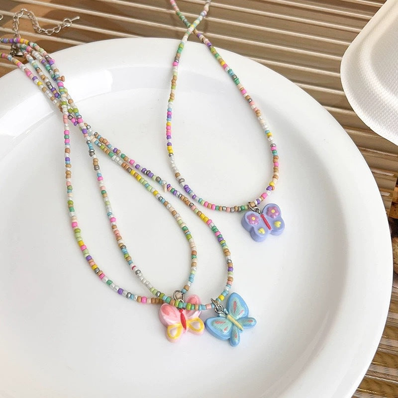 Spend over $40  receive a handmade butterfly necklace for free