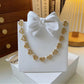 Handmade Pearl Necklace with Heart-Shaped Beads