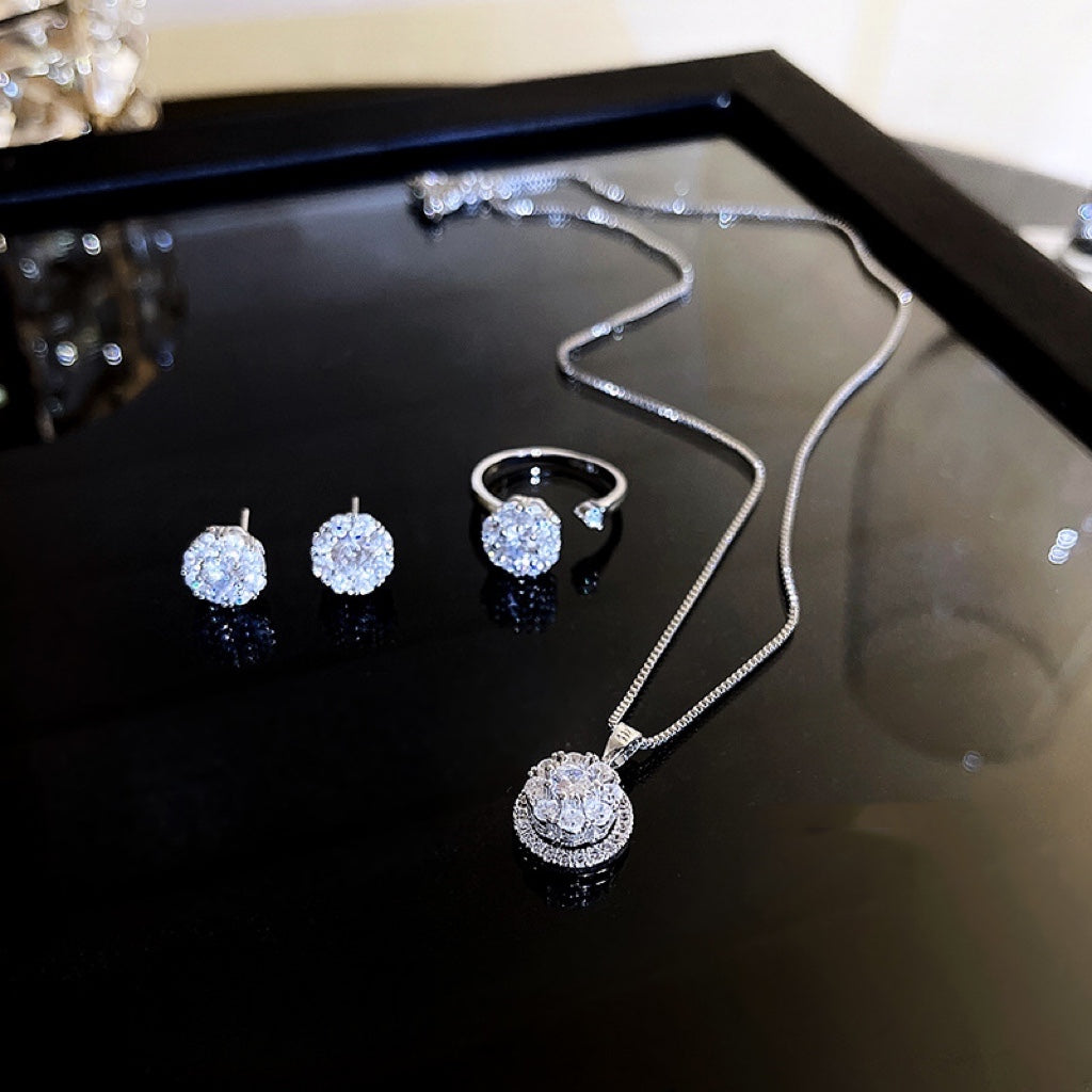 Spend $80 or more at our store and receive a free zircon jewelry set, necklace, ring, earrings