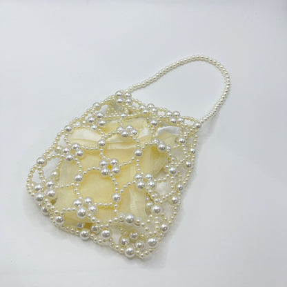 Bolso de mano con perlas y cuentas hecho a mano